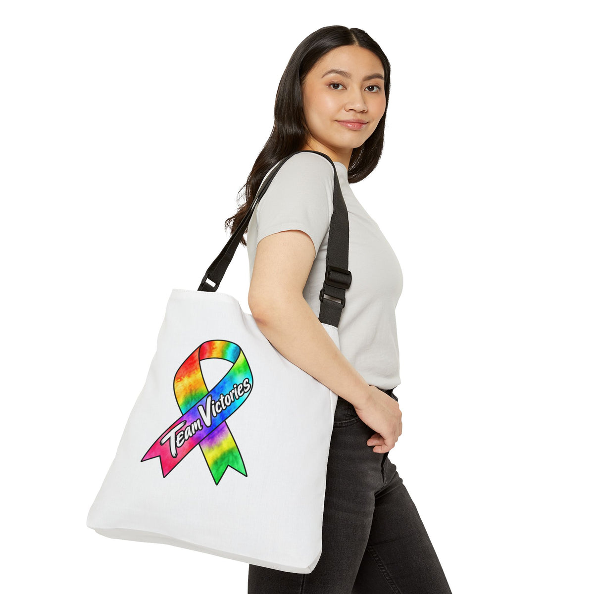 Moooove Over Cancer shoulder tote modeled from the side with colorful printed artwork