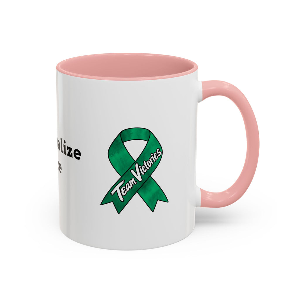 Moooove Over Cancer mug lifestyle view with a Team Victories Liver Cancer awareness ribbon