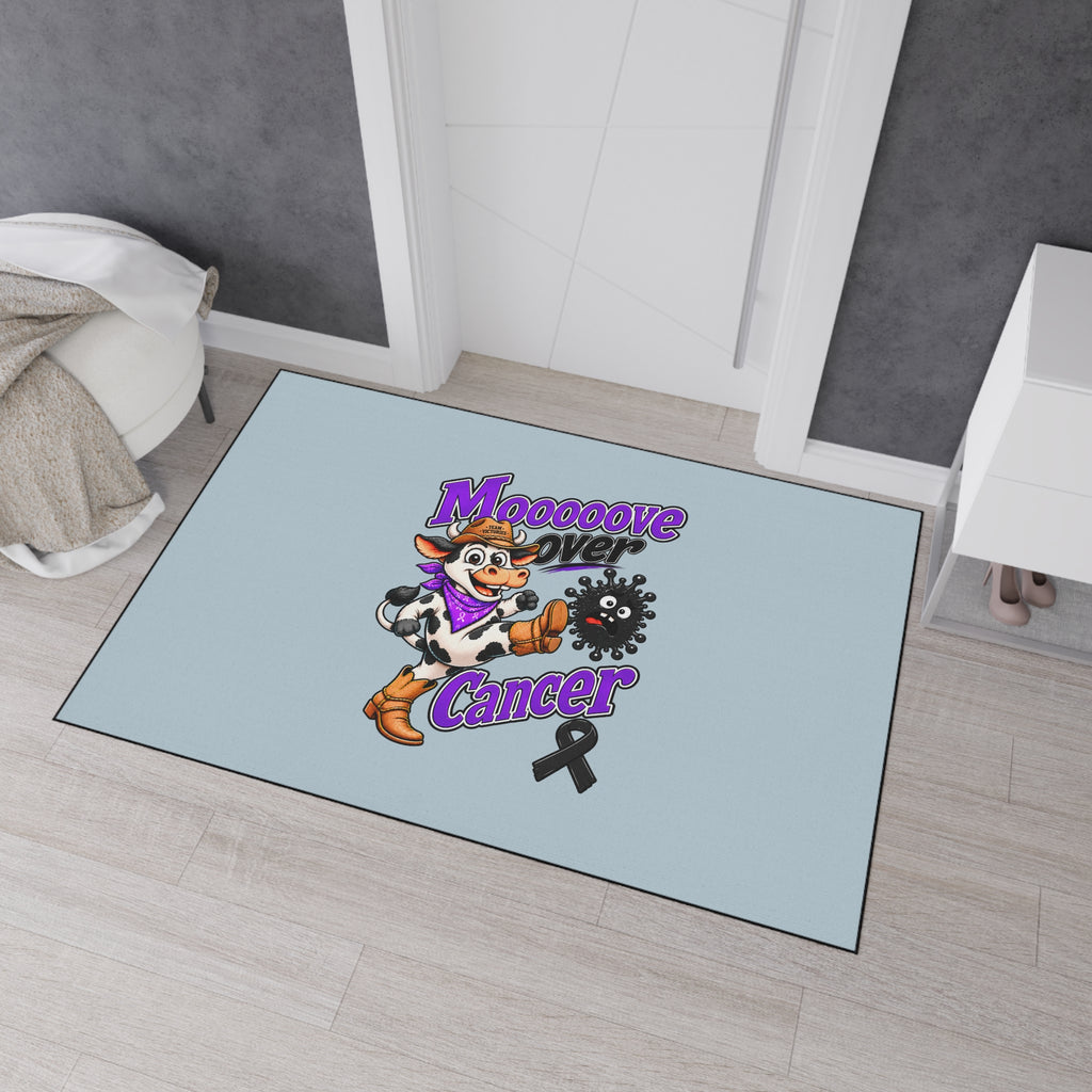 Mooove Over Cancer black ribbon mat displayed in an entryway