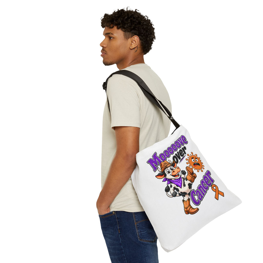 Person wearing the Moooove Over Cancer tote with orange ribbon artwork