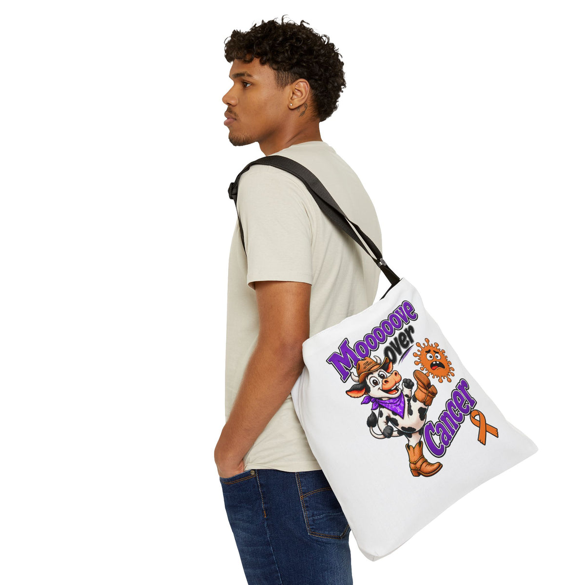 Person wearing the Moooove Over Cancer tote with orange ribbon artwork