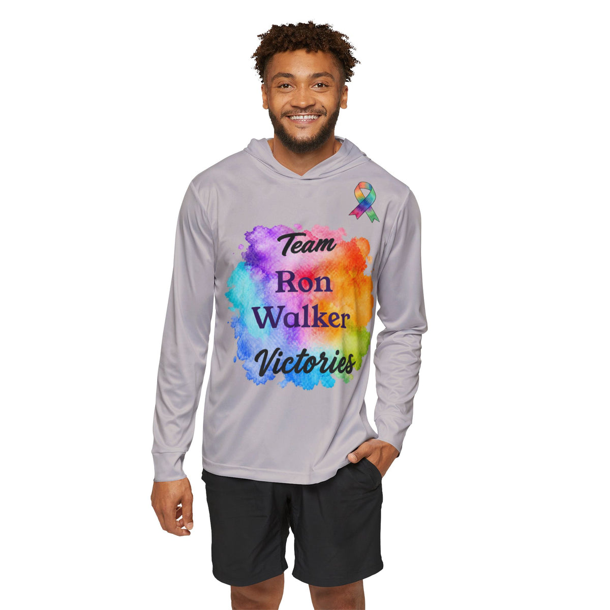 Man wearing a Silver Team Victories hoodie with colorful personalized front artwork