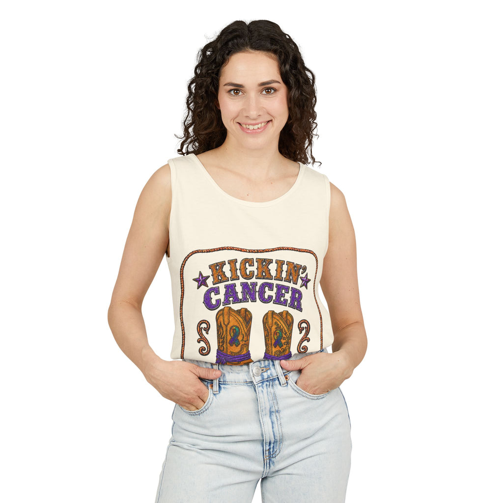 Woman wearing a cream Kickin' Cancer tank top with Western boot artwork