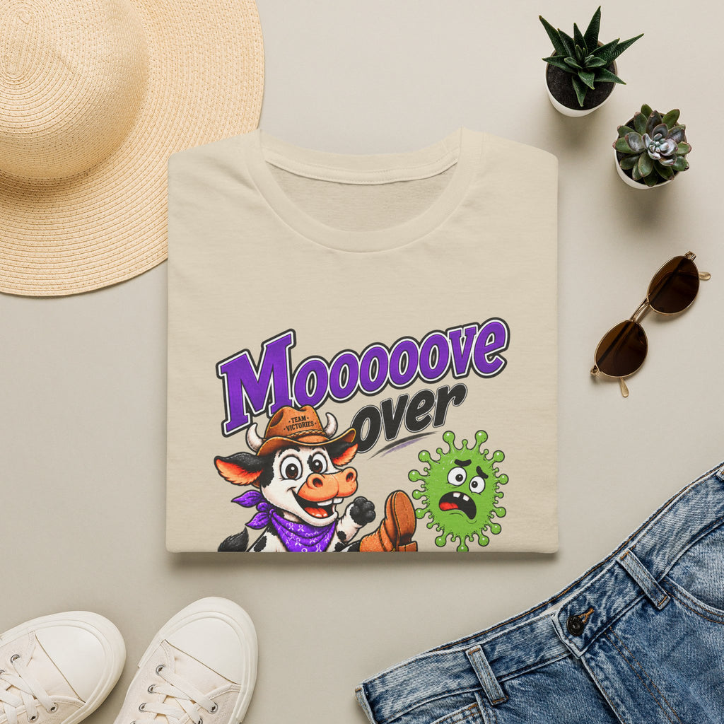 Folded beige Moooove Over Cancer shirt showing Western cowgirl artwork