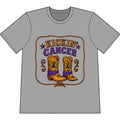 Kickin’ Cancer Cement heavyweight garment-dyed T-shirt with western boot and awareness-ribbon artwork.