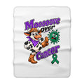 Close view of Moooove Over Cancer blanket with cow artwork and green Liver Cancer awareness ribbon