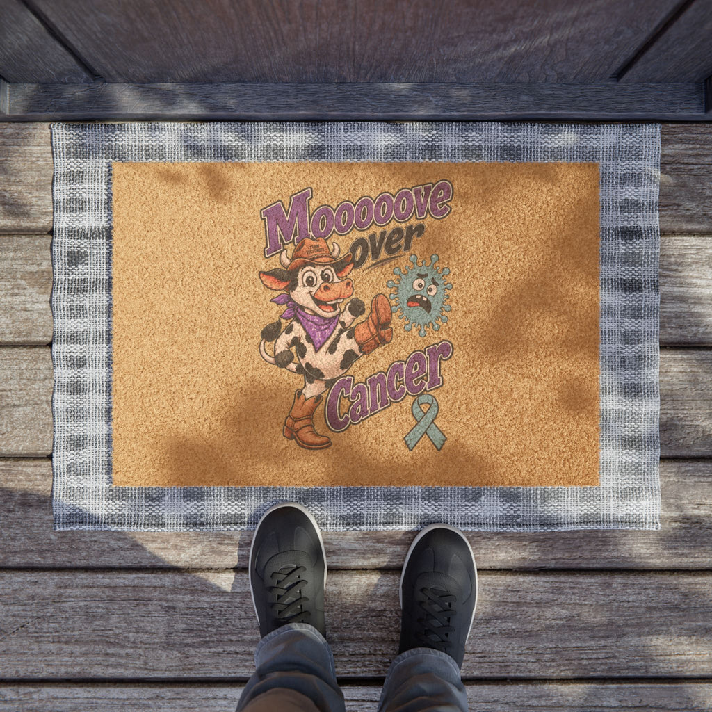 Moooove Over Cancer mat shown at a covered doorway with its colorful design
