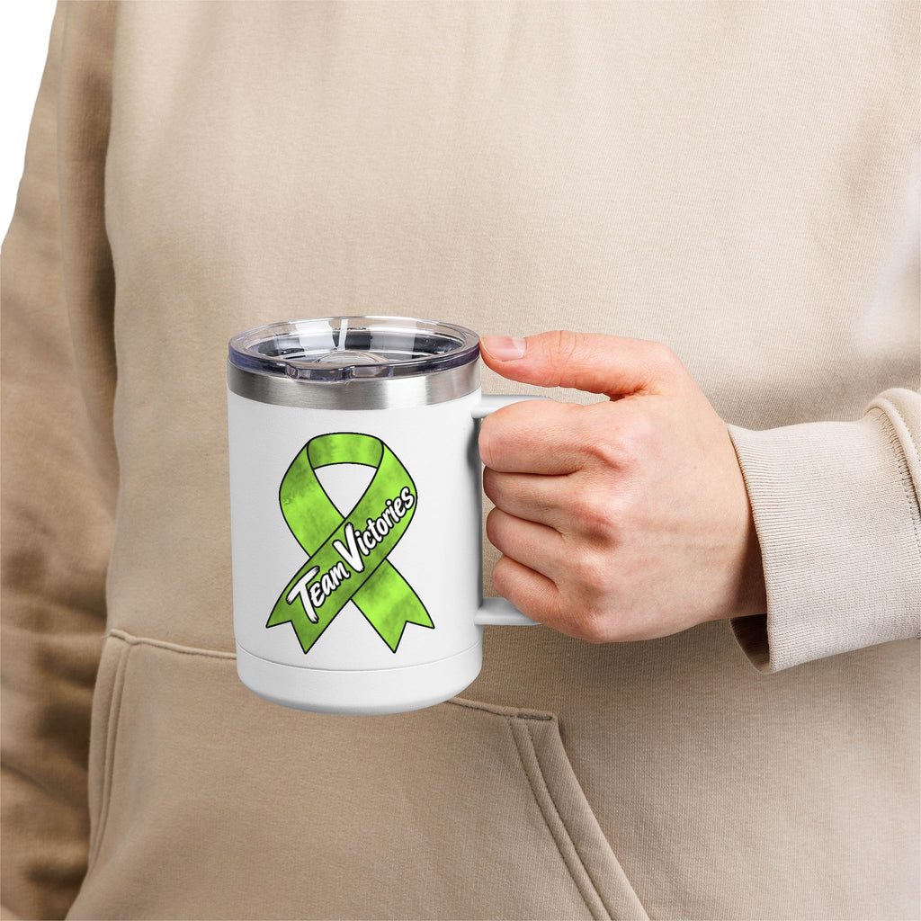 Person holding white Team Victories mug with Non-Hodgkin/Lymphoma Cancer awareness ribbon