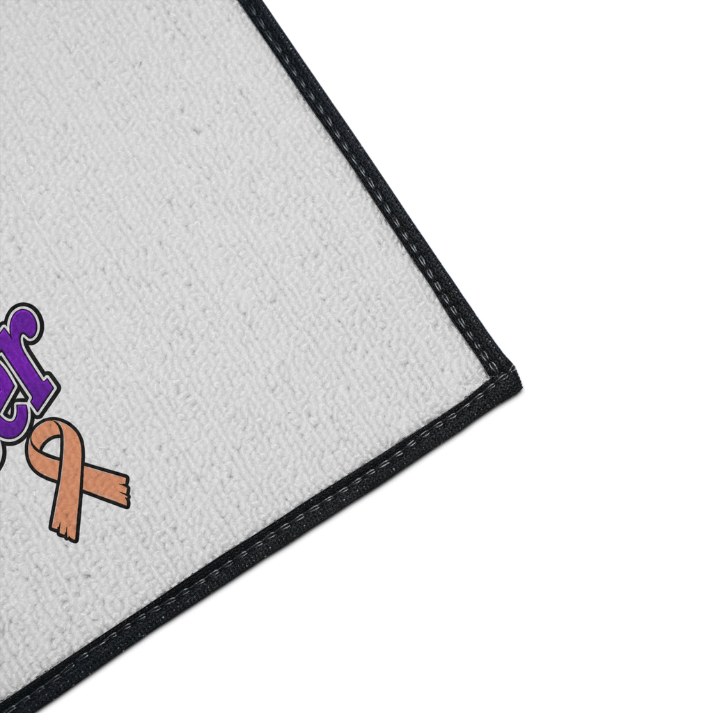 Moooove Over Cancer mat close-up showing textured polyester top and black finished trim