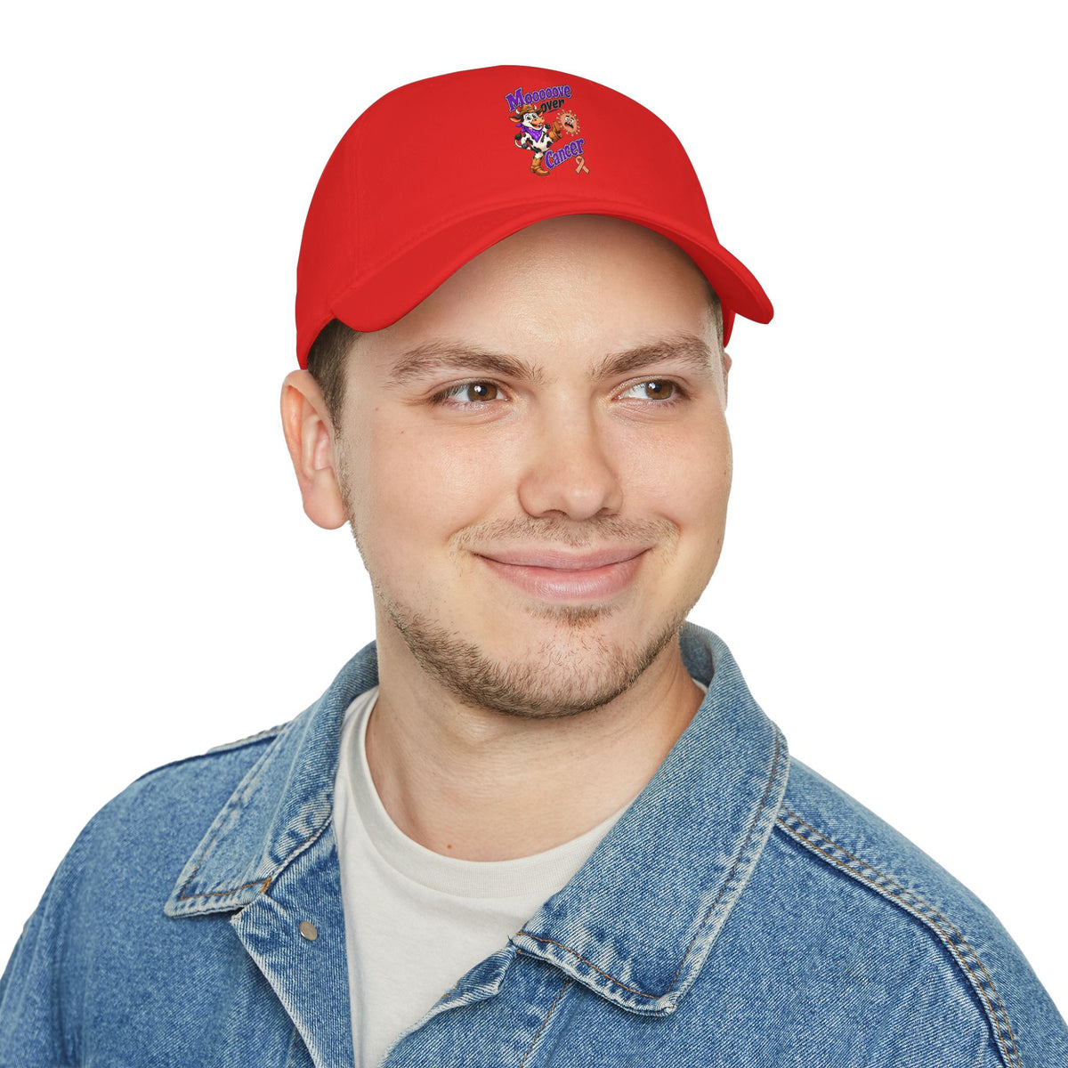 Side view of model wearing the Moooove Over Cancer baseball hat