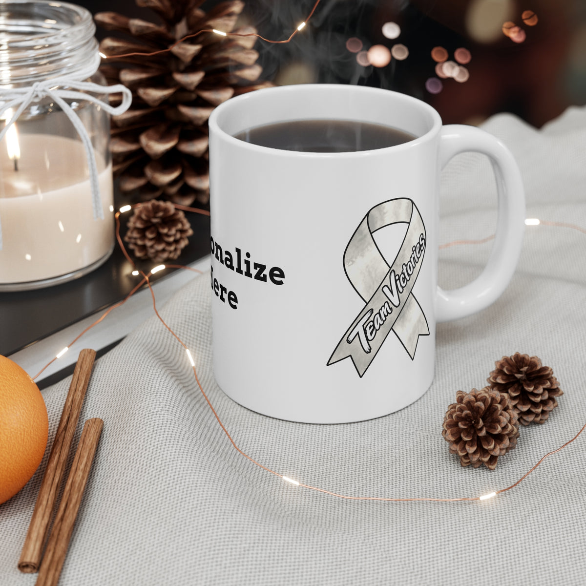 Moooove Over Cancer Team Victories mug with a Lung Cancer awareness ribbon in a cozy setting