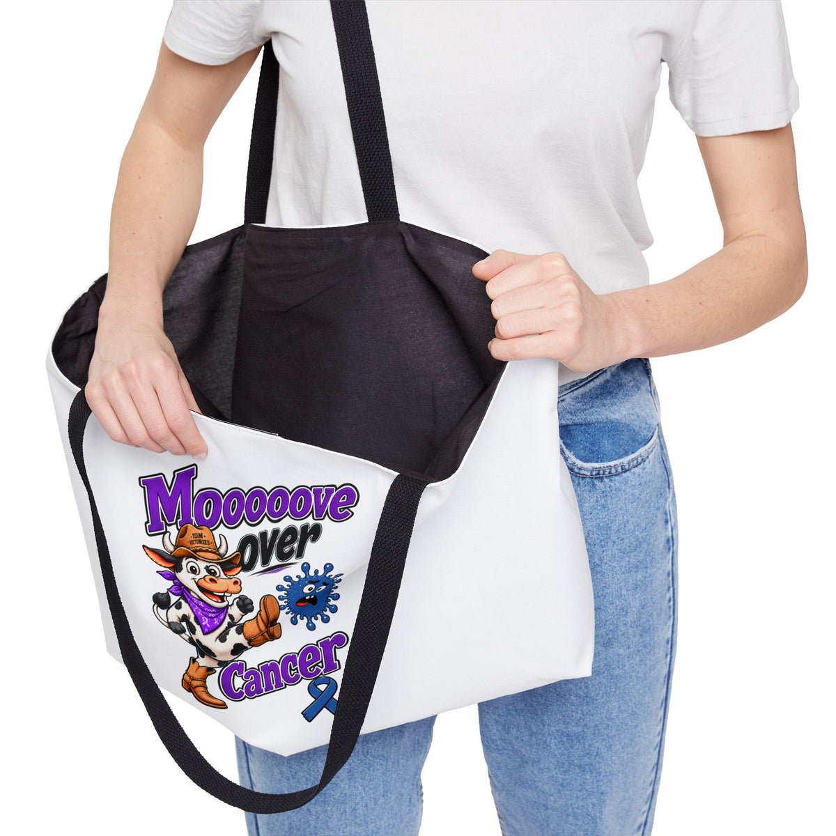 Moooove Over Cancer tote bag showing black interior lining and colorful front artwork