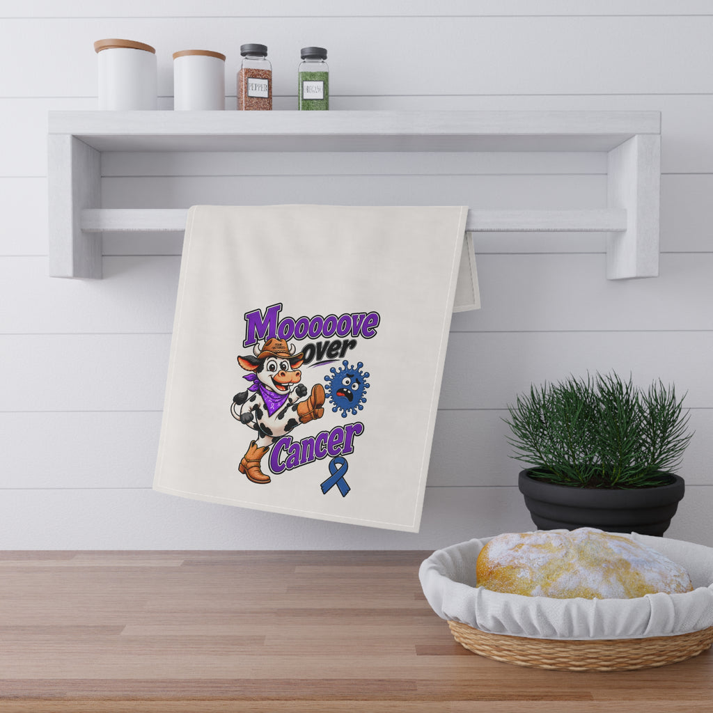 Moooove Over Cancer tea towel displayed in a kitchen with purple cancer awareness design