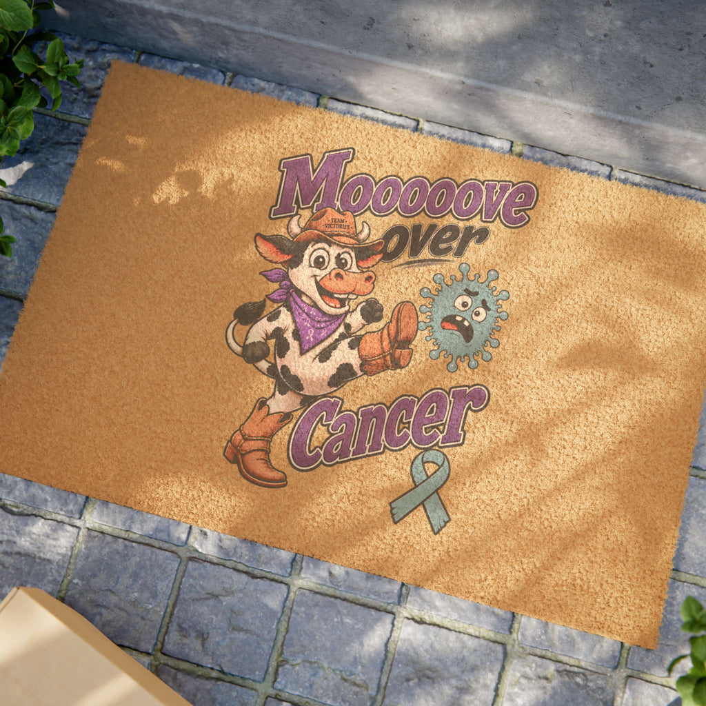 Moooove Over Cancer coir doormat displayed on a stone outdoor entryway
