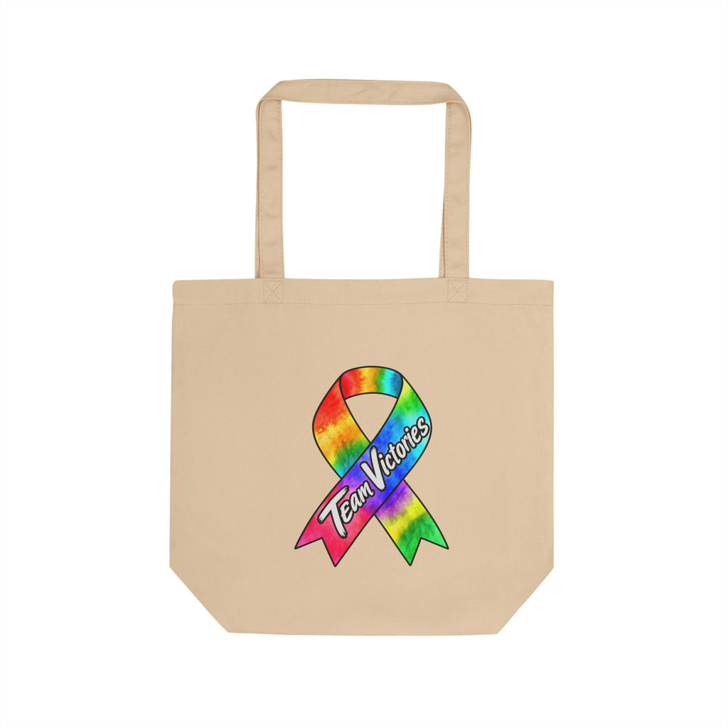 Natural cotton tote bag featuring a colorful Team Victories awareness ribbon