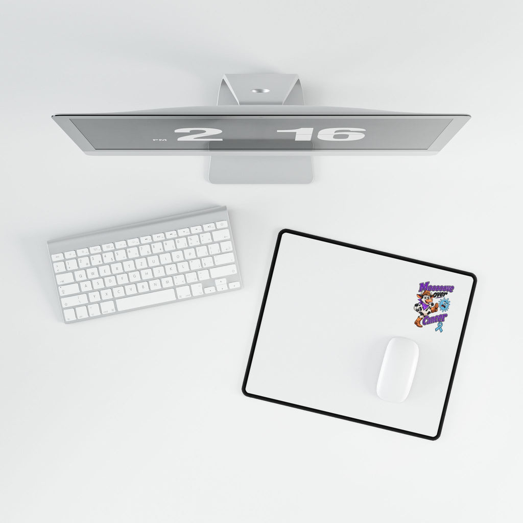 Moooove Over Cancer desk mat with a mouse and keyboard in a desktop setup