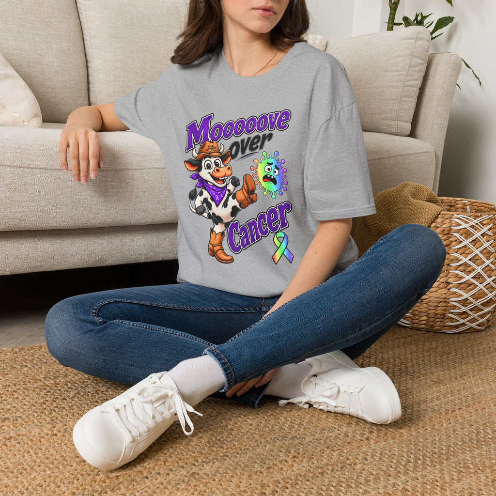 Woman wearing the gray Moooove Over Cancer T-shirt indoors