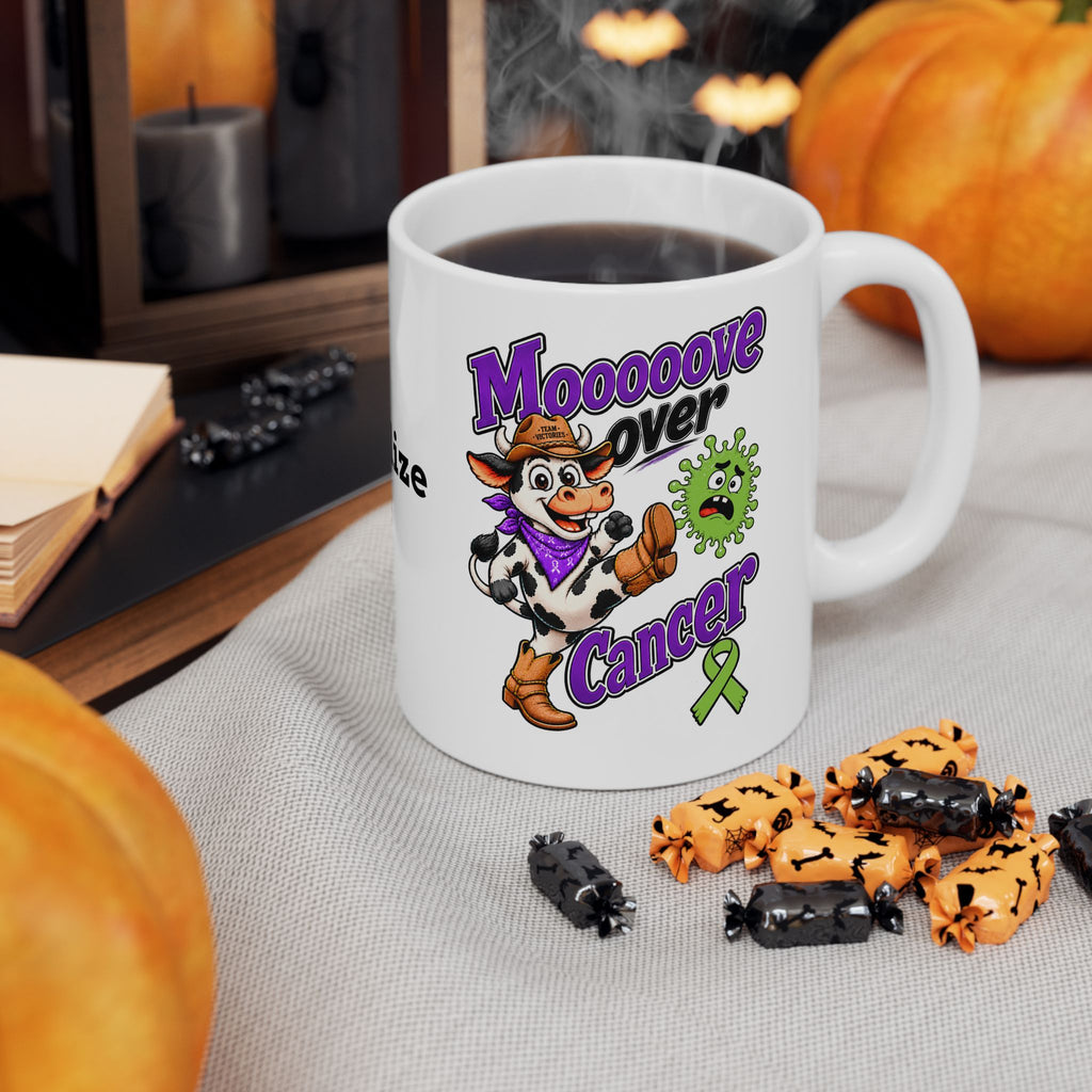 Moooove Over Cancer mug filled with coffee beside seasonal decorations