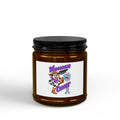 Moooove Over Cancer scented soy candle in an amber glass jar with black lid