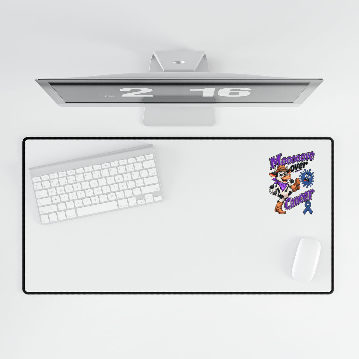 Desk mat with keyboard and mouse showing Moooove Over Cancer Colon Cancer awareness ribbon artwork
