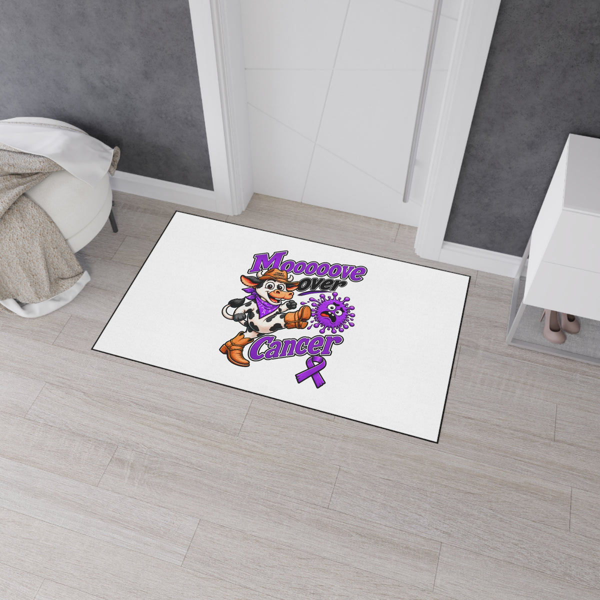 Moooove Over Cancer floor mat near a doorway with playful cow artwork