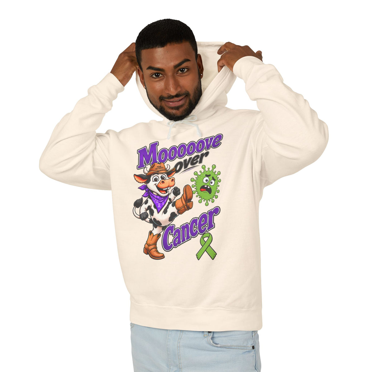 Man wearing the Moooove Over Cancer hoodie with cow artwork and awareness ribbon