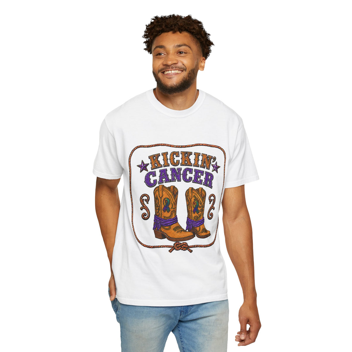 Man wearing a white Kickin' Cancer T-shirt with cowboy boot and awareness artwork