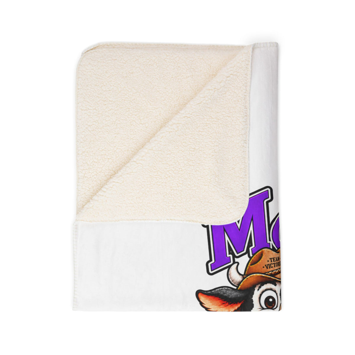 Moooove Over Cancer blanket folded to show cream sherpa backing and Thyroid Cancer awareness ribbon design