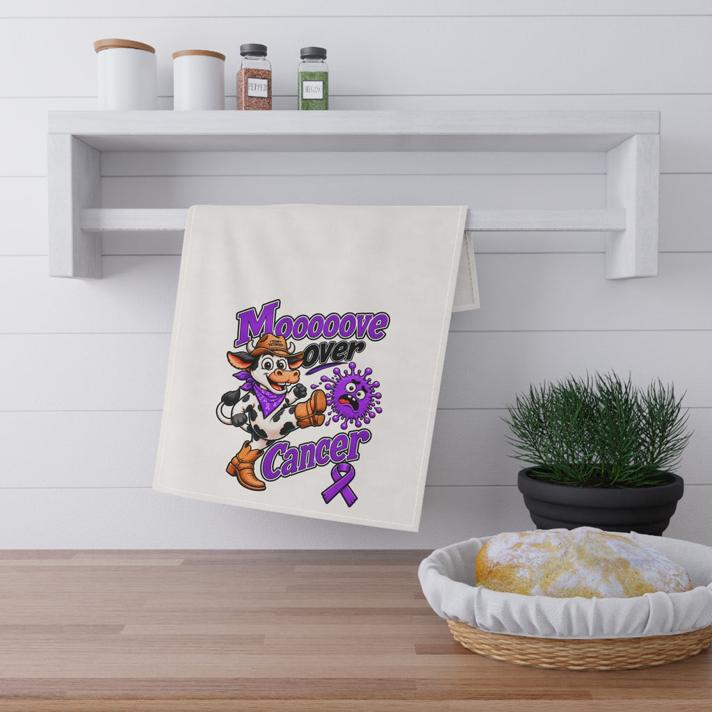 Moooove Over Cancer tea towel displayed in a kitchen with purple cancer-awareness artwork