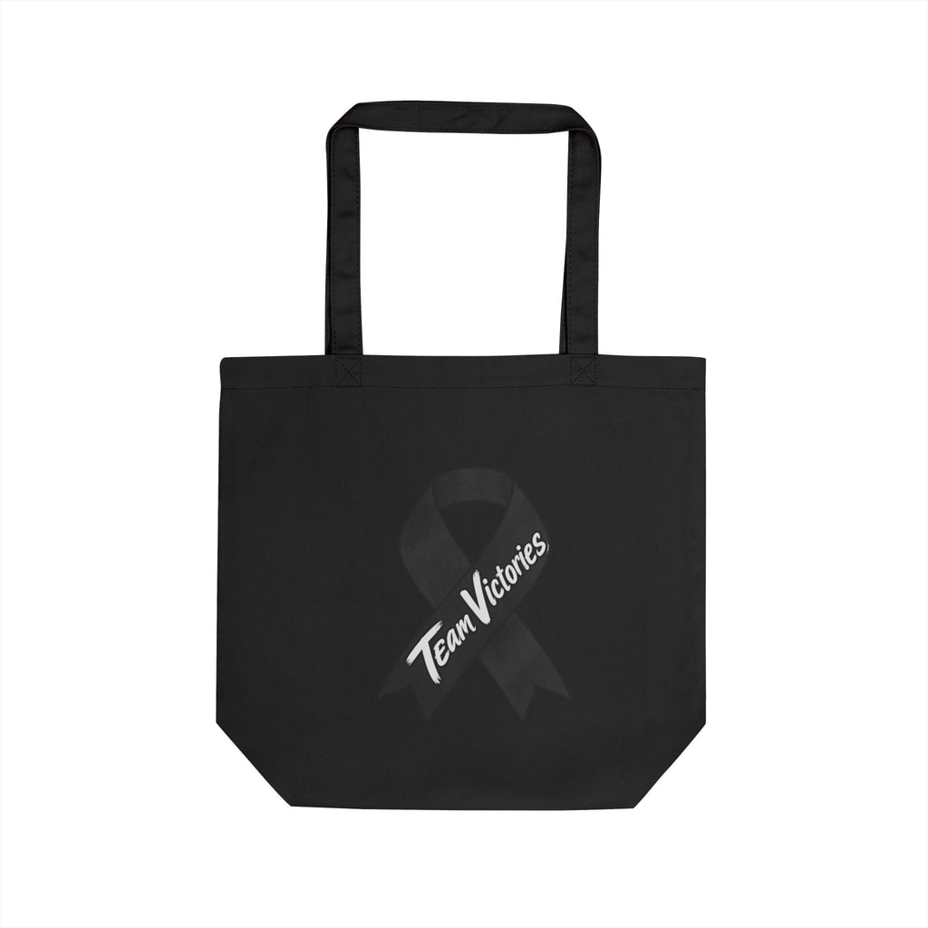 Team Victories awareness ribbon design on the black Moooove Over Cancer tote