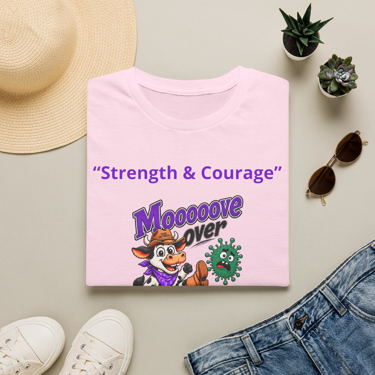 Woman wearing a pink Moooove Over Cancer T-shirt with Fight Baby Fight message