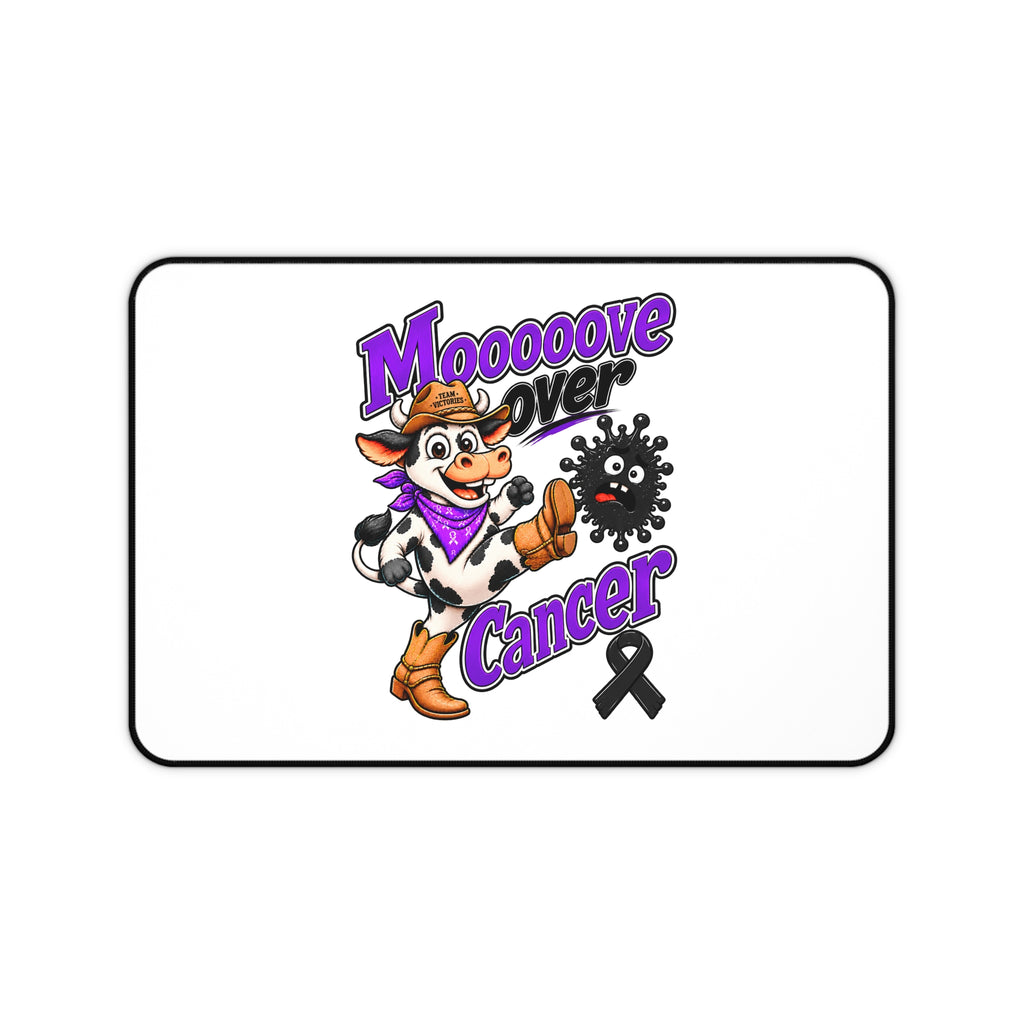 Moooove Over Cancer cow, purple lettering, and black ribbon on a white desk mat