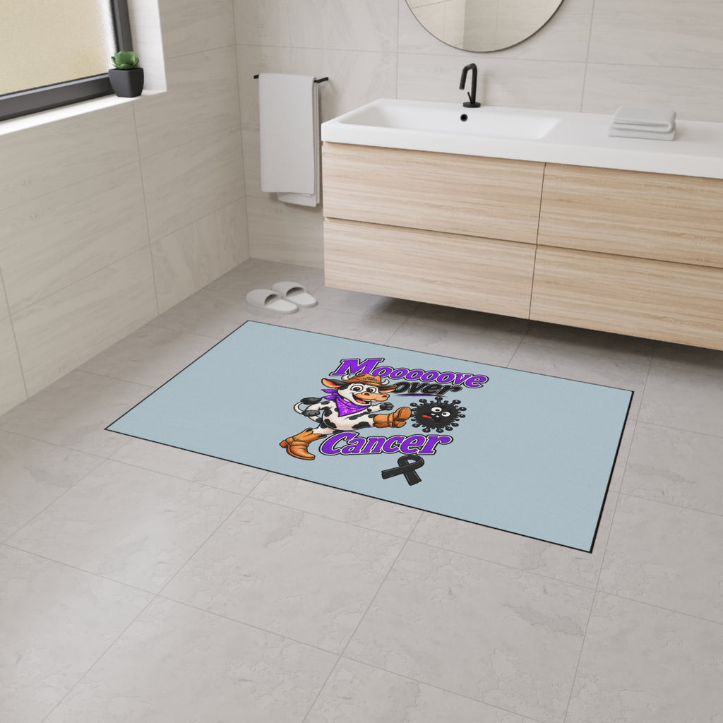 Mooove Over Cancer floor mat styled beside a bathroom vanity