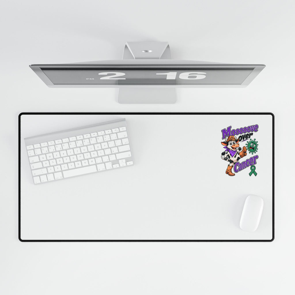 Moooove Over Cancer desk mat showing Liver Cancer awareness ribbon artwork with keyboard and mouse