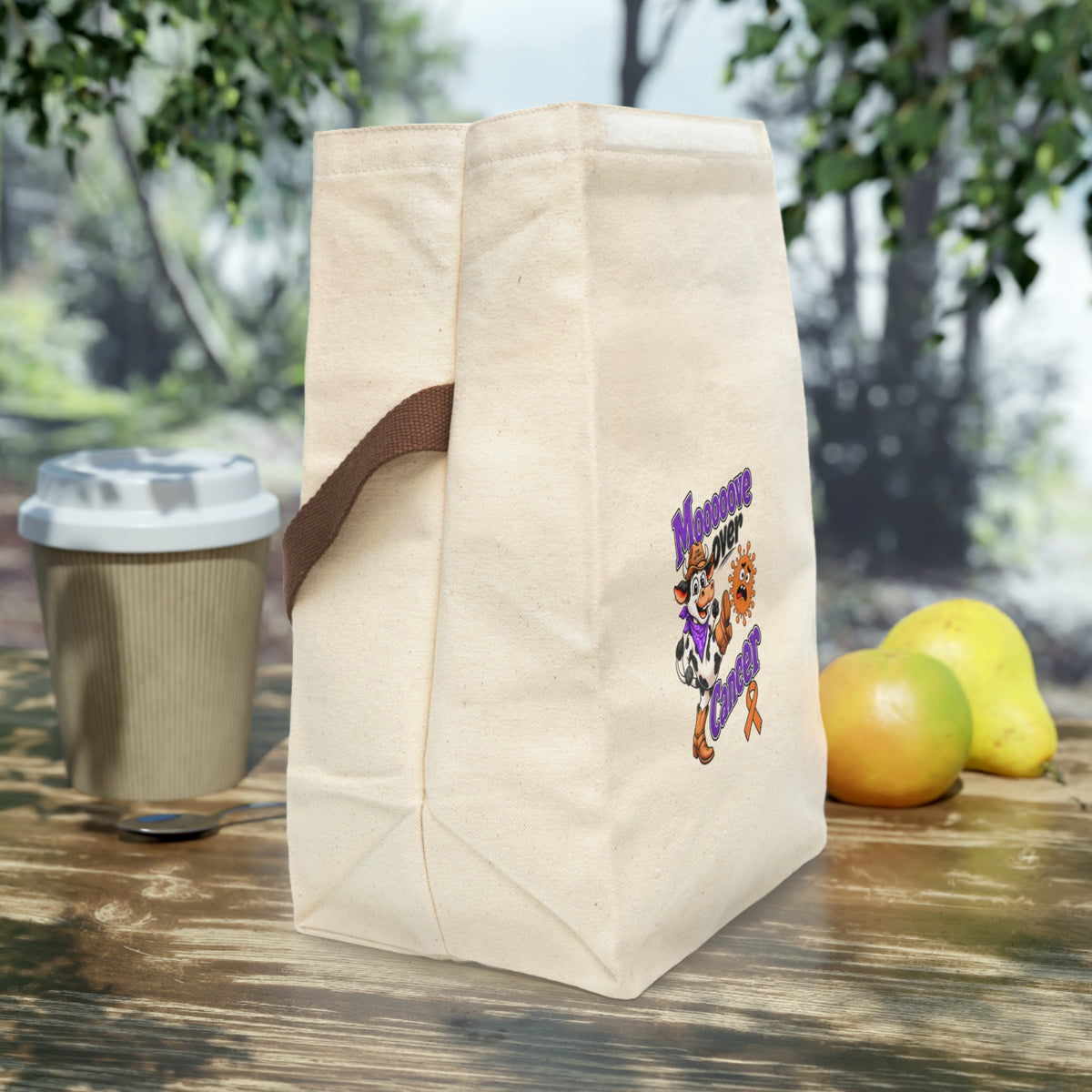 Side view of Moooove Over Cancer natural cotton canvas lunch bag with strap handle