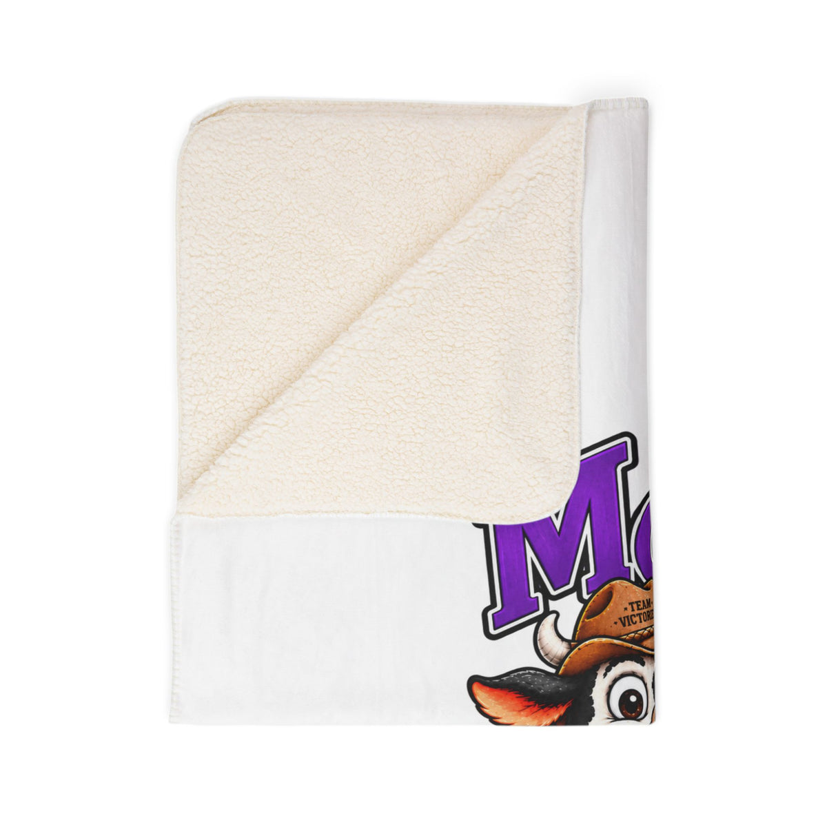 Folded Moooove Over Cancer sherpa blanket with printed cow artwork and Leukemia/Kidney Cancer ribbon