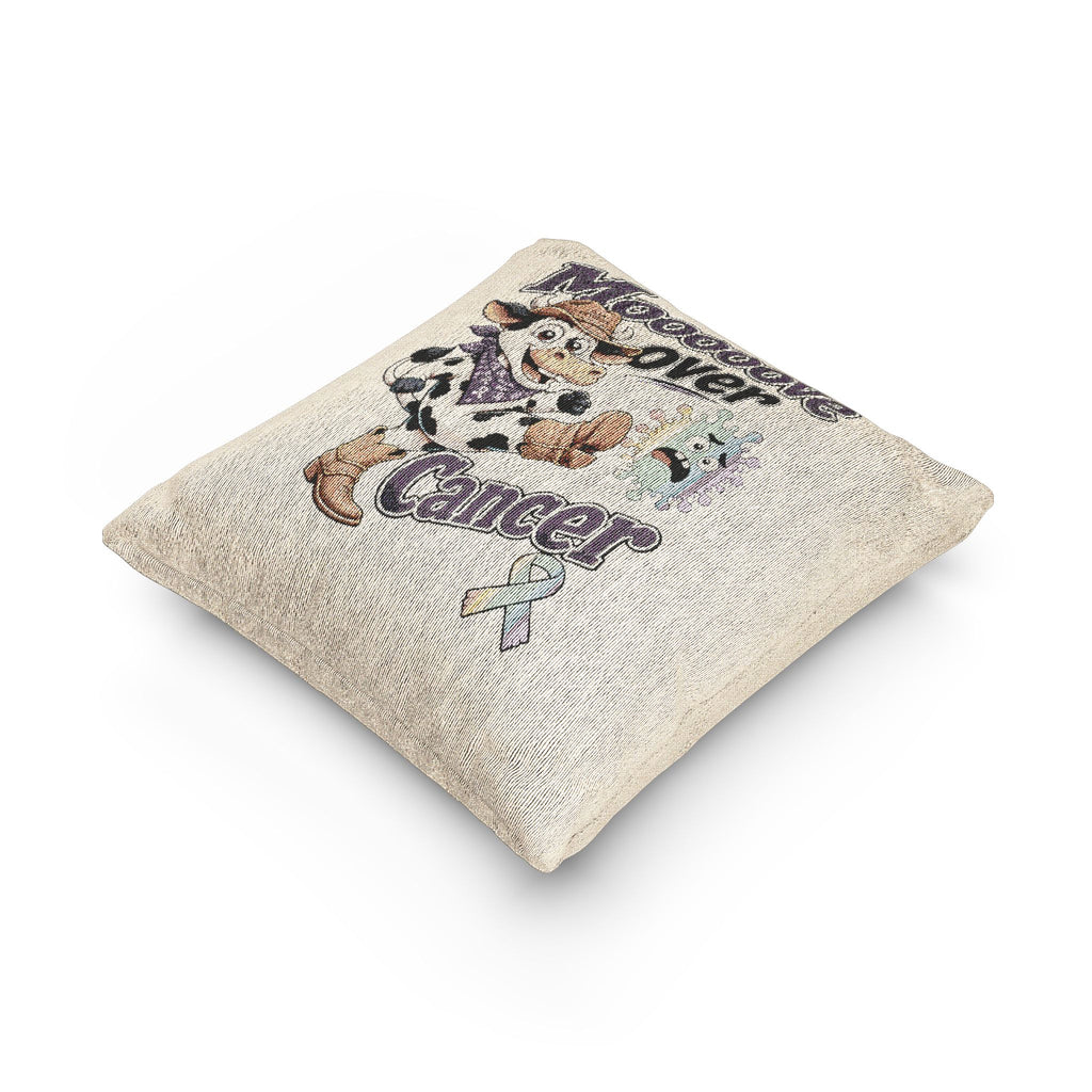 Angled view of Moooove Over Cancer woven accent cushion with textured fabric and ribbon artwork