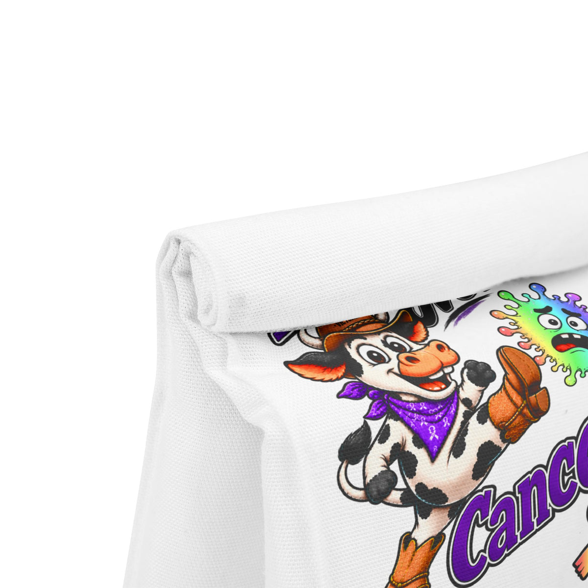 Close-up of Moooove Over Cancer cow artwork and fold-over flap on the lunch bag