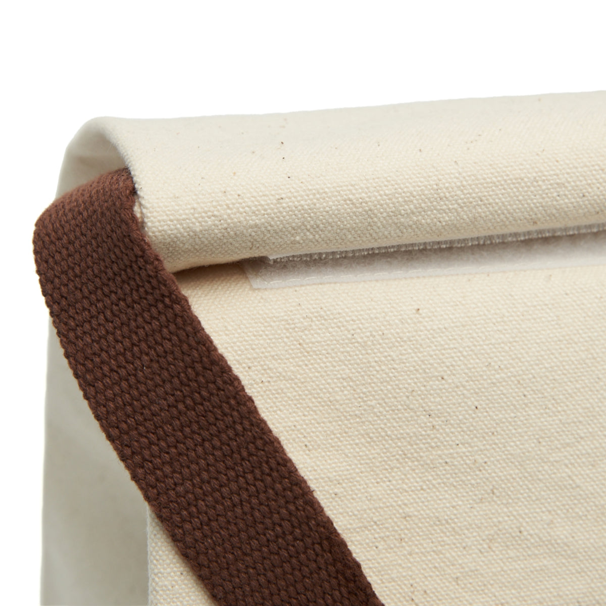 Close-up of Moooove Over Cancer lunch bag roll-top hook-and-loop closure