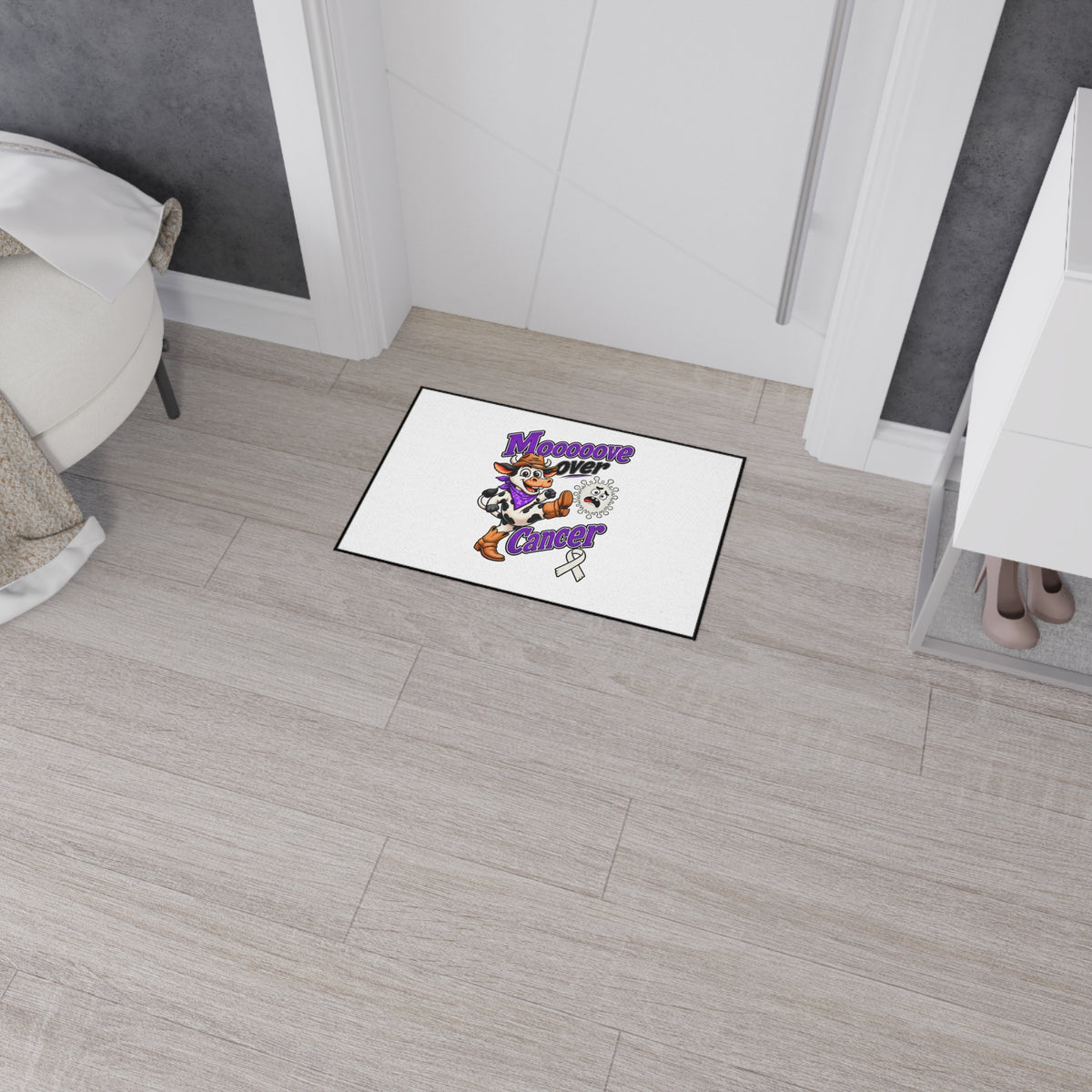 Moooove Over Cancer floor mat near a doorway with colorful cowgirl design