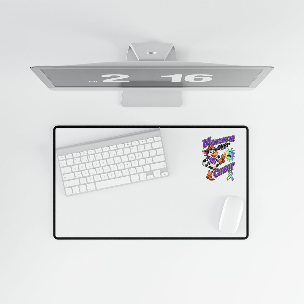 Moooove Over Cancer desk mat displayed with keyboard and mouse from above