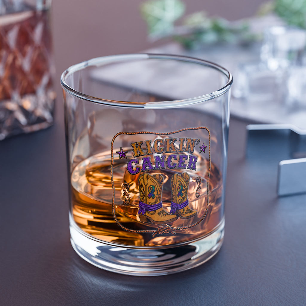 Kickin’ Cancer 10 oz glass tumbler filled with an amber drink and western artwork