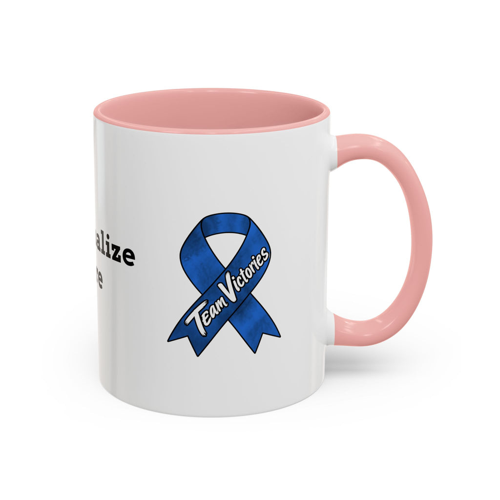 Moooove Over Cancer Colon Cancer awareness ribbon mug beside coffee and spoon
