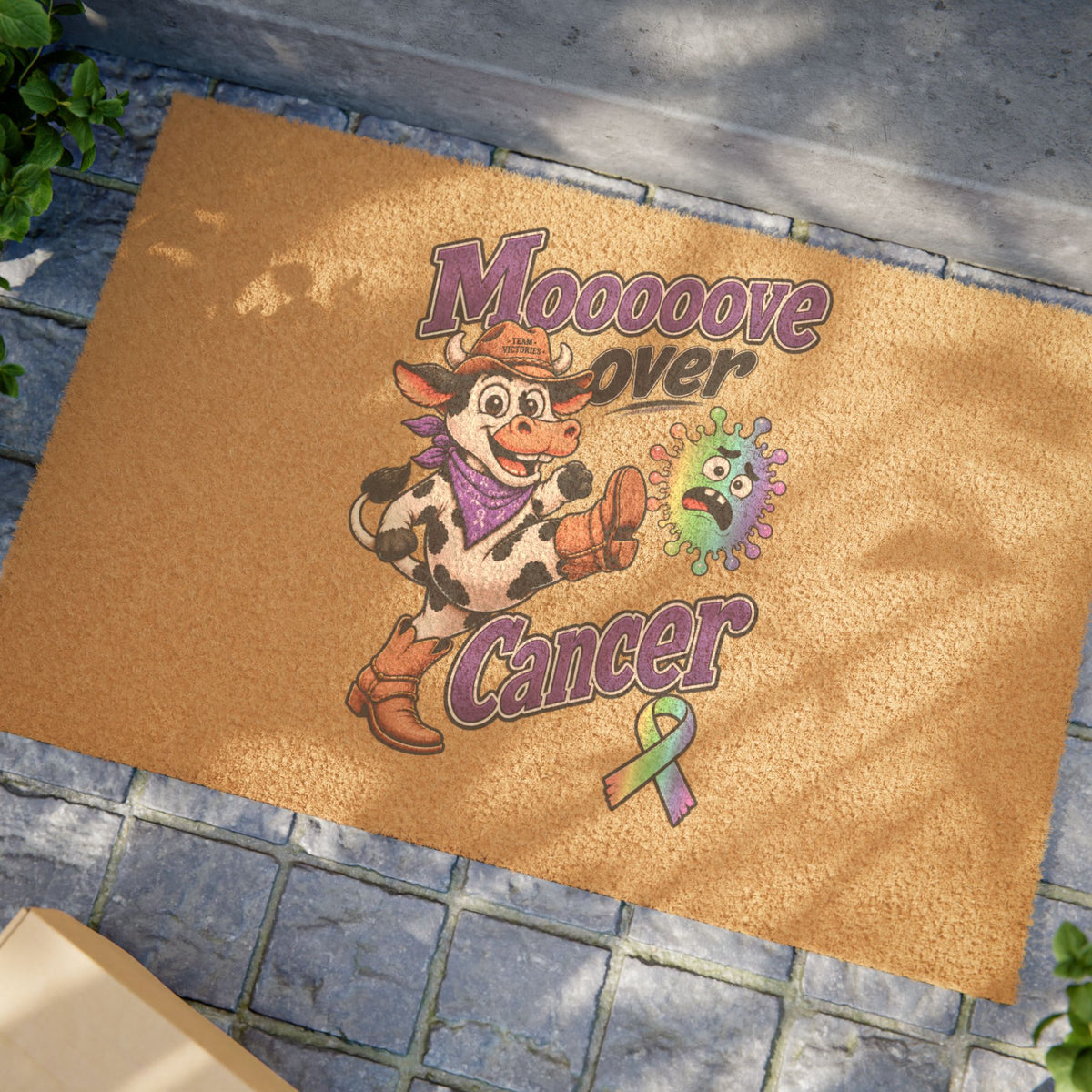 Moooove Over Cancer coir welcome mat displayed at an outdoor front entry