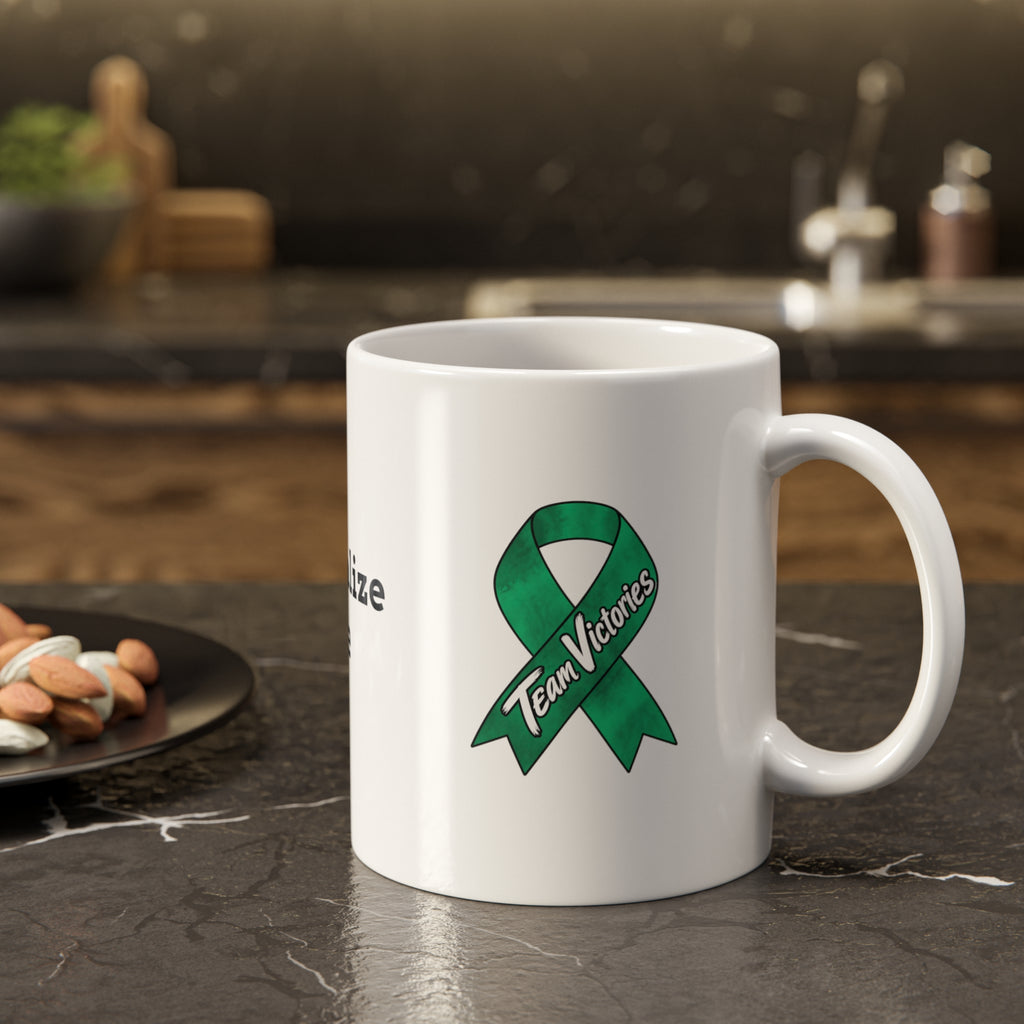 Moooove Over Cancer Team Victories mug with green ribbon displayed in a kitchen setting
