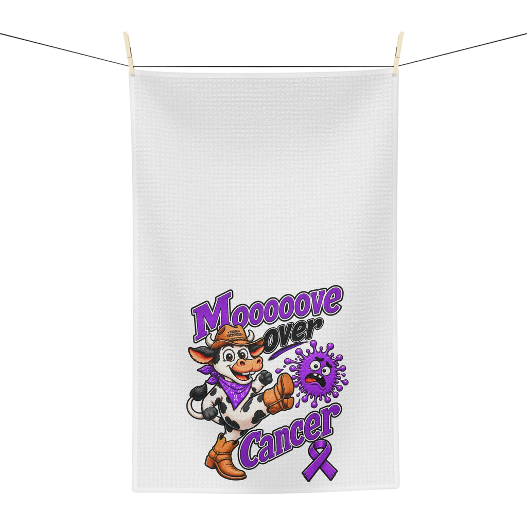 Moooove Over Cancer tea towel hanging outdoors with cow artwork and purple ribbon