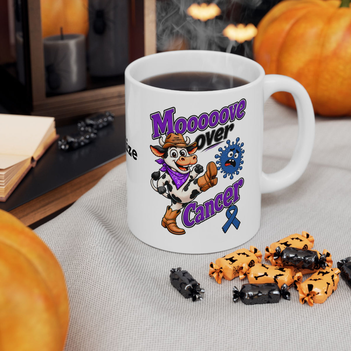 Moooove Over Cancer ceramic mug with cow artwork, Colon Cancer awareness ribbon, and hot coffee