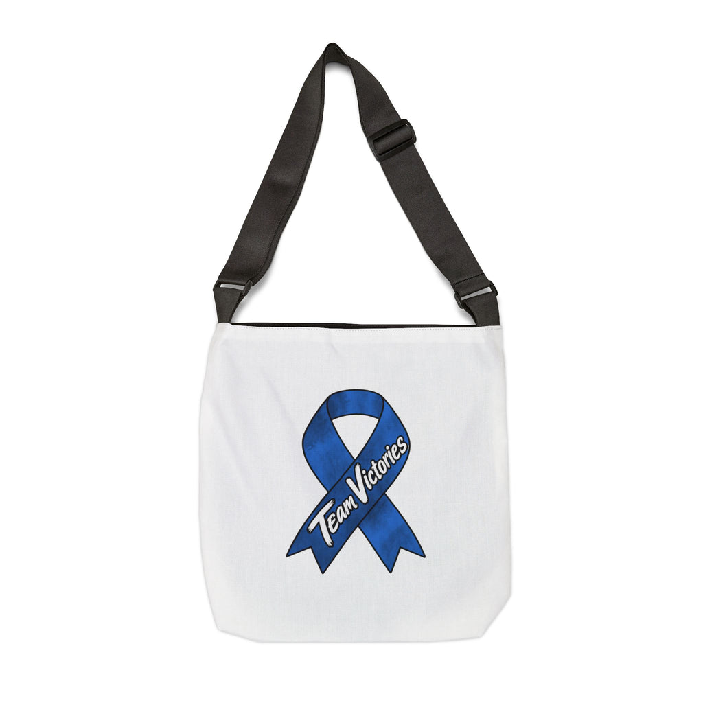 Team Victories blue ribbon artwork on the reverse side of a white shoulder tote