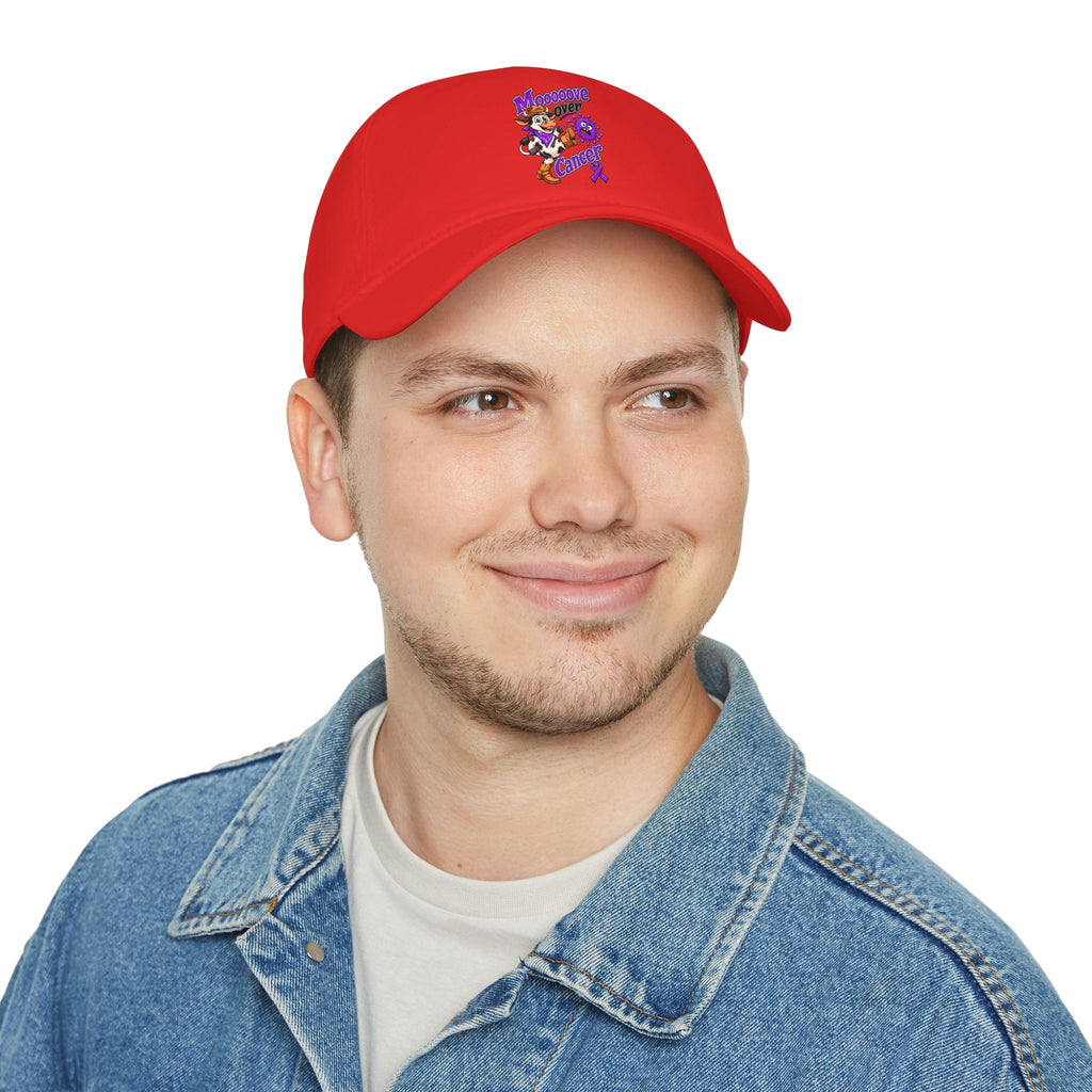 Man wearing a red Moooove Over Cancer low-profile baseball hat