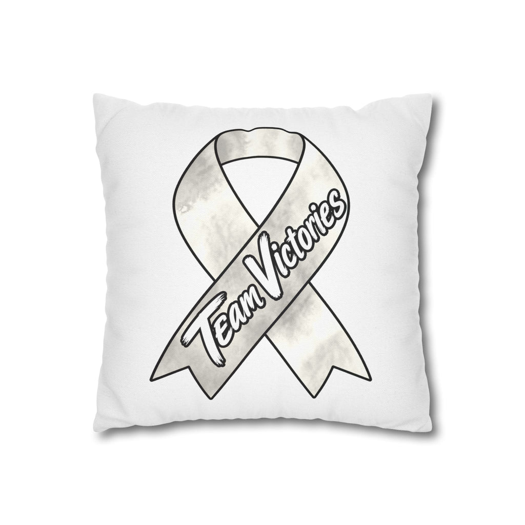 Moooove Over Cancer pillowcase displayed on a sofa with Lung Cancer awareness ribbon design